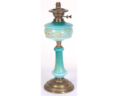 A BRASS AND BLUE GLASS OIL LAMP, converted, 52cm high