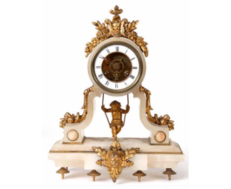 A FRENCH LATE 19th CENTURY SWINGING CHERUB MANTEL CLOCK the ormolu mounted onyx case enclosing a skeletonised 3.5" enamel dia