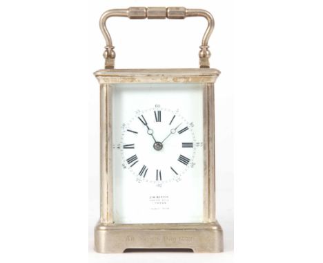 A LATE 19TH CENTURY FRENCH SILVERED BRASS STRIKING EIGHT-DAY CARRIAGE CLOCK having an enamel dial with Roman numerals, fronti
