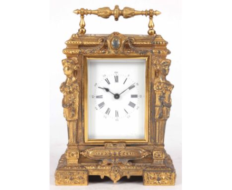 A LATE 19th CENTURY FRENCH GILT CASED CARRIAGE CLOCK with figural columns enclosing a 2.25" porcelain dial fronting an eight-