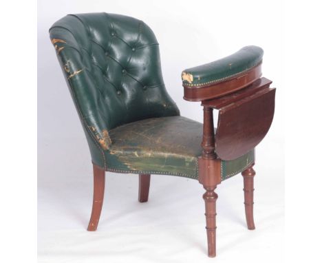 A 19TH CENTURY STYLE MAHOGANY AND GREEN LEATHER "COCK FIGHTING" CHAIR with lift up arm rest, fold down writing surface and bu