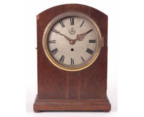 AN OAK CASED RAF BRACKET CLOCK BY ELLIOTT, LONDON the arched top case with cast brass bezel enclosing a 7.5" silvered convex 