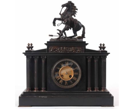 A LATE 19th CENTURY FRENCH BLACK SLATE AND BRONZE MOUNTED MANTLE CLOCK of architectural style with six bronze Corinthian colu