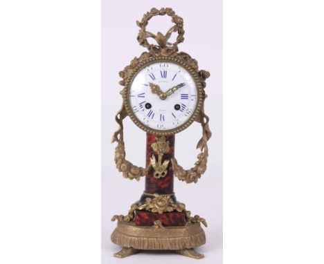 A MID 19TH CENTURY ORMOLU MOUNTED DRUMHEAD PILLAR MANTLE CLOCK with faux tortoiseshell and floral swag work decoration. Havin