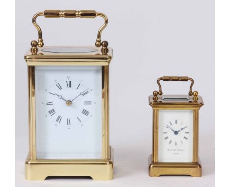 TWO EIGHT DAY BRASS CASED CARRIAGE CLOCKS the larger clock having French spring driven movement with cylinder escapement 17.5