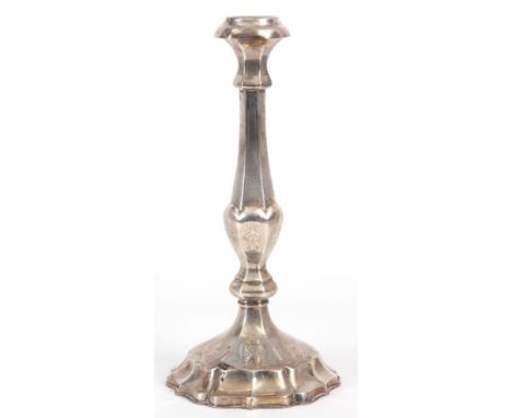 A SILVER CONTINENTAL CANDLESTICK with filled base 33.5cm high