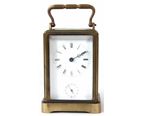 A MID 19th CENTURY FRENCH ONE PIECE CASED CARRIAGE CLOCK with a 2.25" porcelain Roman dial with subsidiary alarm dial below f