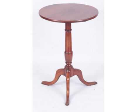 A LATE VICTORIAN MAHOGANY TRIPOD TABLE with circular top standing on a ring turned vase shaped stem with tripod base 70cm hig