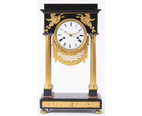 A LATE 18th CENTURY FRENCH ORMOLU AND SLATE PORTICO MANTLE CLOCK with slate stepped top mounted with ormolu mythical horses s