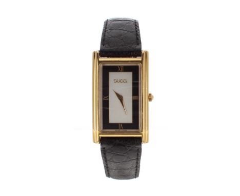 Gucci gold plated rectangular gentleman's wristwatch, ref. 2600M, rectangular silvered dial with black chapter, black leather