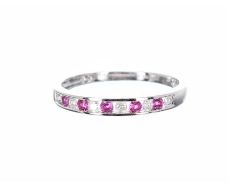 9k white gold ruby and diamond half eternity ring, band width 3mm, ring size M