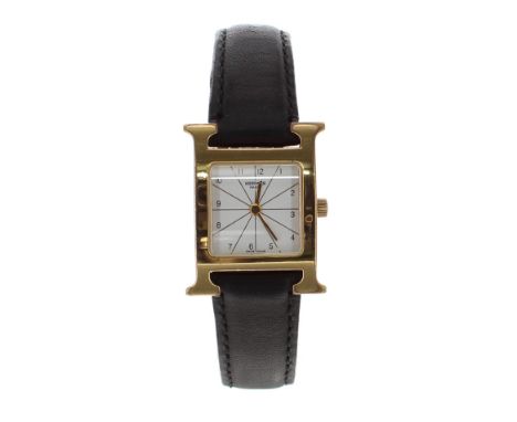 Hermes Heure H gold plated and stainless steel lady's wristwatch, ref. RS1 201, square silvered dial, modern black leather st