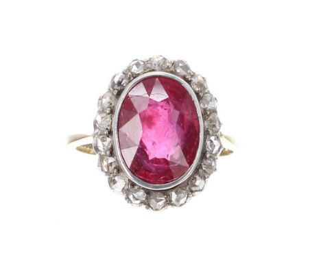 18k ruby and mine-cut diamond oval cluster ring, the ruby 4ct approx, cluster 17mm x 14mm, 5gm, ring size N 
