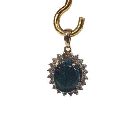 Cabouchon black opal and diamond oval 9ct pendant, the opal measuring 11mm x 10mm, depth 6mm, round brilliant-cut diamonds, 0