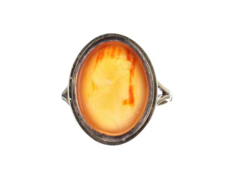 9ct cornelian oval intaglio ring depicting a portrait of a man, 22mm x 17mm, 4gm, ring sizeJ/K 
