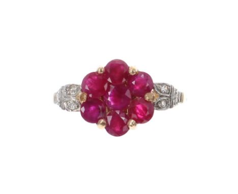 18k and platinum ruby and diamond floral cluster ring, with seven round-cut rubies with diamond set shoulders, width 12mm, 3.