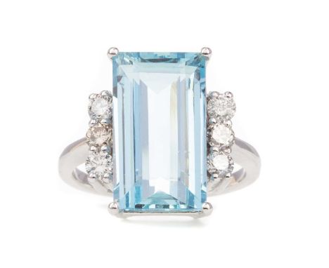 AQUAMARINE AND DIAMOND RING,set with a step cut aquamarine of approximately 7.00 carats flanked by round brilliant cut diamon