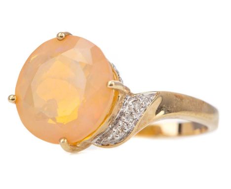 FIRE OPAL AND DIAMOND RING,set with a round fire opal, on diamond shoulders, in nine carat gold, size N 1/2, 3.6g