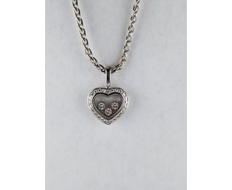 Chopard Happy Diamonds 18K White Gold Heart Necklace. Marked on both Pendant and Necklace. Total Weight: 12.5 g Approx Diamon
