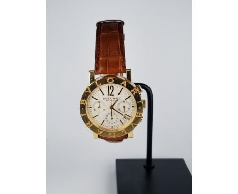 The BB38 is on a brown crocodile strap and original 18 karat yellow gold tang buckle. Case Size: 38mm Model Number: BB 38 GL 
