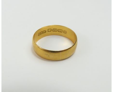 A 22ct gold wedding band, finger size K, 2.97g gross