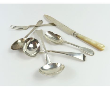 Two Exeter silver sauce ladles 18cm, a “Trefid” sppon and fork, silver and mother of pearl cake knife and a fiddle pattern sp