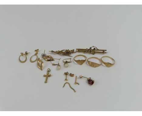 A bar brooch set with split pearls and a blue stone, marked '15ct', 2.38g gross; a bar brooch set with split pearls and two b