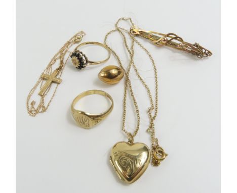 A 9ct gold signet ring, finger size O; a 9ct gold charm in the form of a rugby ball; a 9ct gold sapphire and diamond cluster 