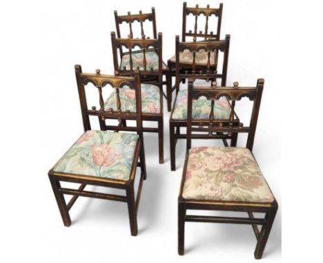 Six Ercol chairs with drop in cushions and gallery style supports