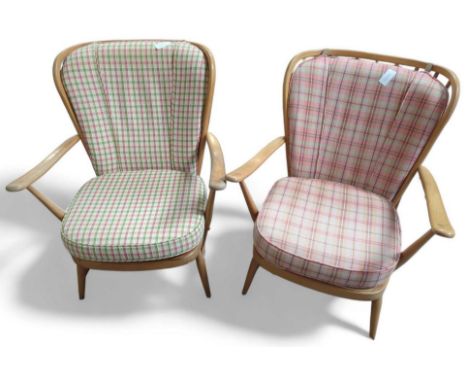 Two Ercol armchairs with cushions and attachable support cushions