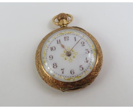 A small continental open faced pocket watch, the round white enamel dial, with brown Arabic numerals and gold hands, with gol