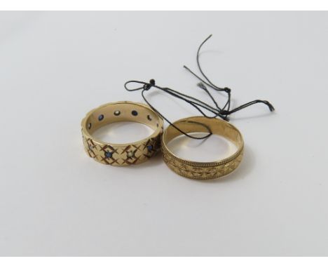 A patterned 9ct gold wedding band, finger size Q leading edge, and a 9ct gold full eternity ring, set with small blue and whi