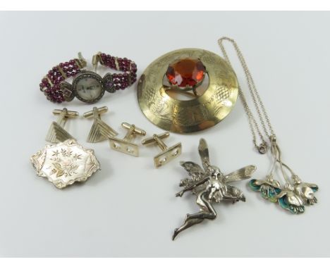 A silver and enamel flower pendant on chain, an Art Nouveau style brooch of a fairy, a Victorian aesthetic style brooch and o