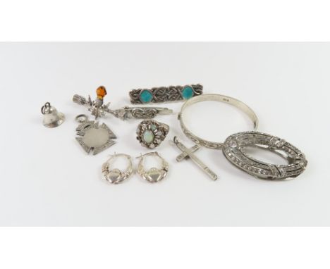 A silver christening bangle, a silver fob medal engraved to the back ' The Ryan Cup 1929-30', a silver and enamel bar brooch 