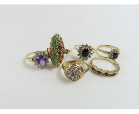 A 9ct gold emerald set dress ring, finger size P 1/2, a 9ct gold purple and white stone cluster ring, finger size P, a 9ct go