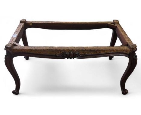A 19th century French mahogany sofa stool frame, on decorative cabriole legs, 39cm high, 84cm wide, 49cm deep