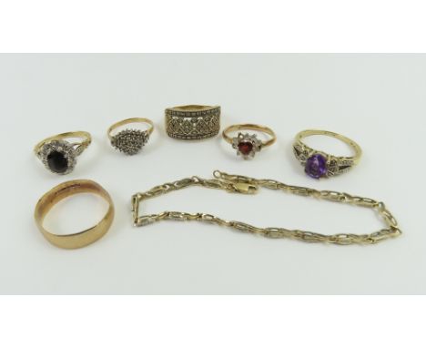 A 9ct gold diamond dress ring, finger size T centre; a 9ct gold sapphire and diamond cluster ring, finger size P; a 9ct gold 