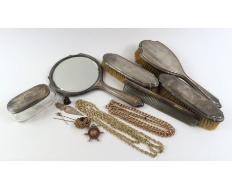 A silver backed dressing table set, comprising three brushes, hand mirror, comb and powder pot; costume jewellery and collect