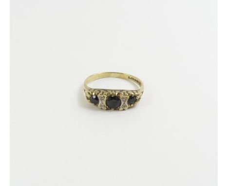 A 9ct gold sapphire and diamond Victorian style ring, finger size O, 2.2g gross, cased