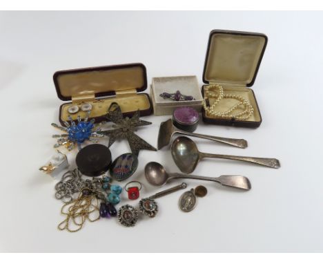 A small silver and purple enamel pill box, a treen box with red seal of a snake, a large Maltese cross and various other item