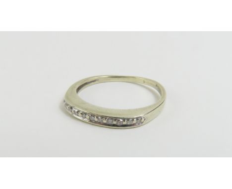 A white gold diamond half eternity ring, finger size L, marked '9ct', 1.66g gross