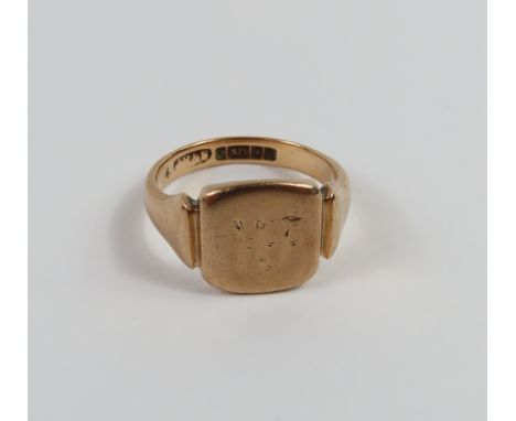 A 9ct gold signet ring, with square head and tapered shoulders, finger size O, 5.6g gross