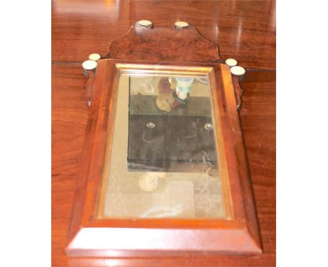 Dutch walnut , cushion wall mirror with original glass. 72 x 35 cms. Together with a Victorian flower painted corner shelf.