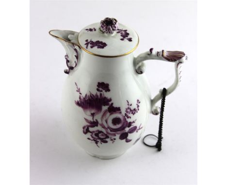 A Meissen 19th century porcelain chocolate pot and cover decorated with enamel flowers, underglazed cross swords mark.16cms h