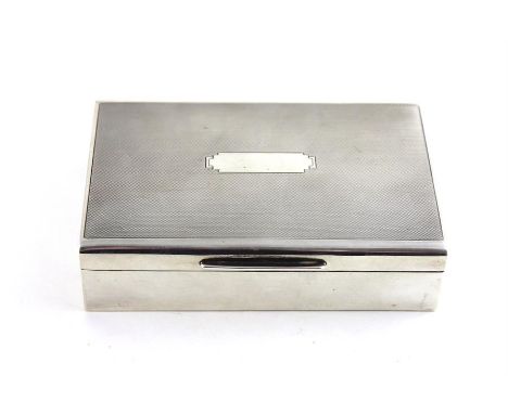 A&nbsp;silver cigarette box, by Ernest. W. Haywood, Birmingham 1939. having engine turned lid with blank cartouche. Height 3.