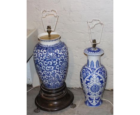 Two large blue and white 20th cent Chinese vases , converted to lamp bases, one with wooden stand. Largest height 79cm, 23cm 