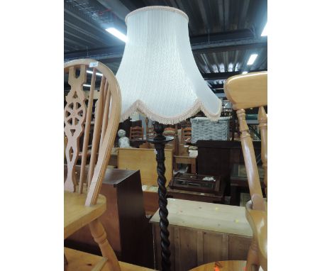 A traditional twist column standard lamp