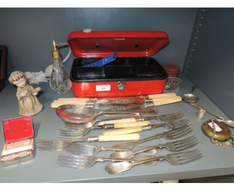 A selection of vintage bone handle flatware and cutlery