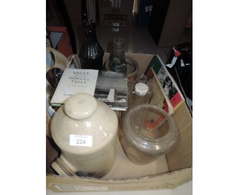 A selection of curios and trinkets including A Wainwright guide book