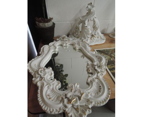 A modern decorative ceramic mirror and wall sconce shelf bracket etc